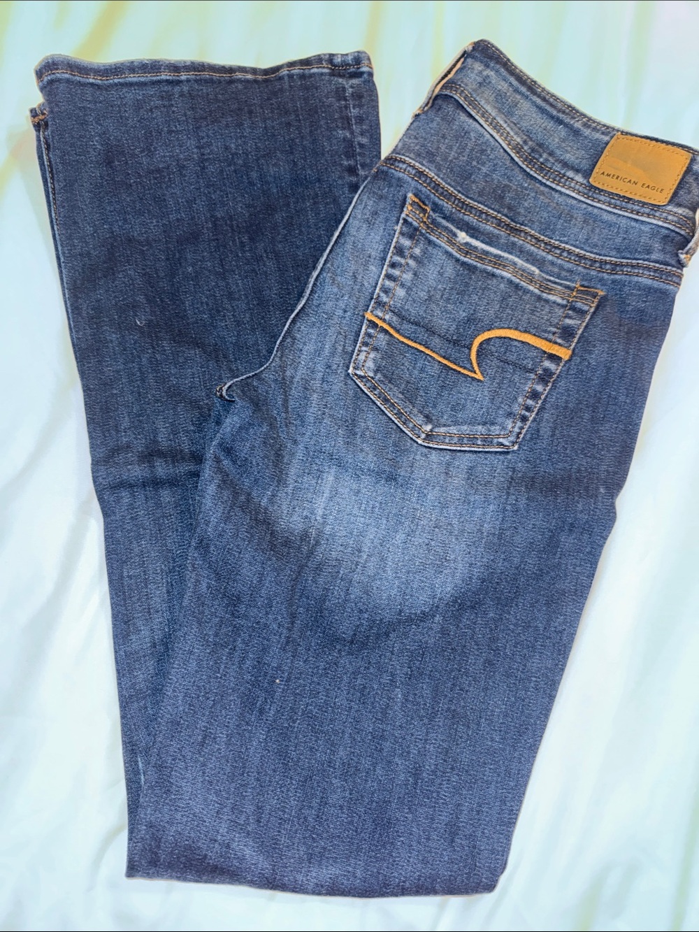 American Eagle Dark Blue Boot Cut Jeans with Tan Stitching